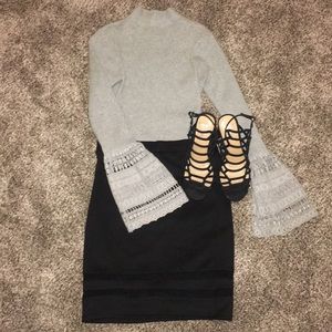 Faux-turtleneck with lace crochet bell sleeves